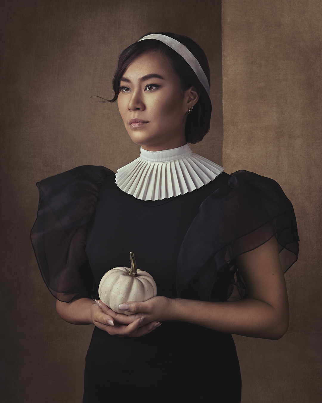 Finished painterly edit of a portrait with a pleated collar