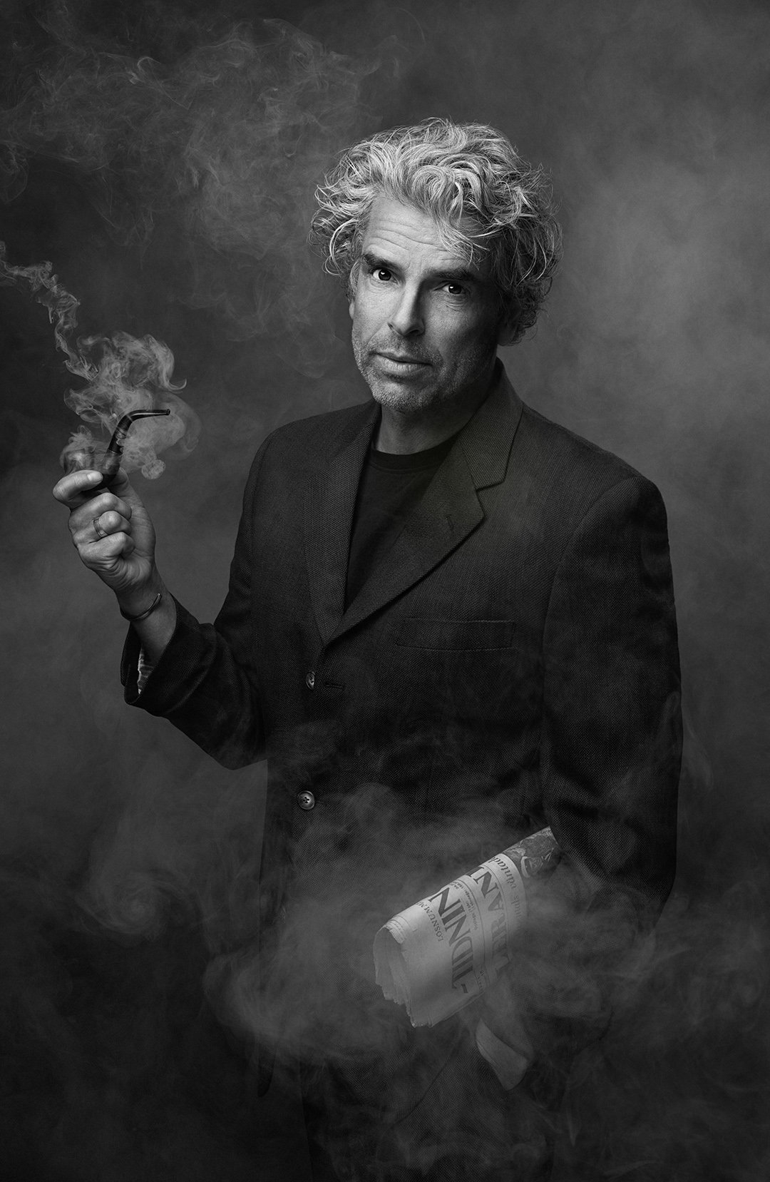 Fine Art portrait of a man with a pipe and drifting smoke