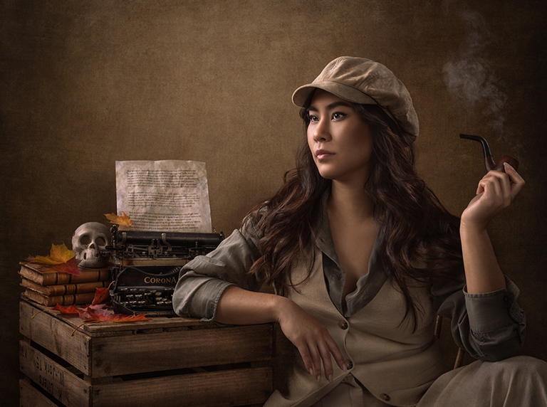 Fine Art portrait with a vintage typewriter and props